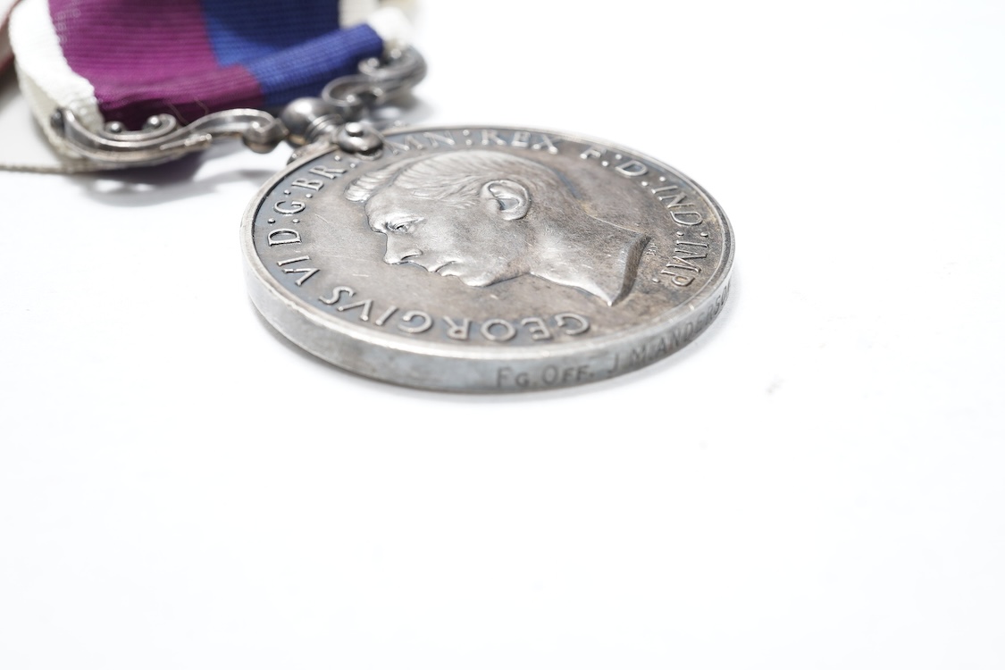 A WWII medal group awarded to Sqdn. Ldr. J.M. Anderson. R.A.F., also engraved under the ranks of Private (7260344), and Flight Officer, comprising of seven medals (three engraved)